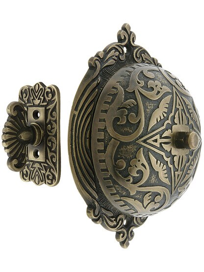 Eastlake Style Twist Door Bell in Antique Brass.